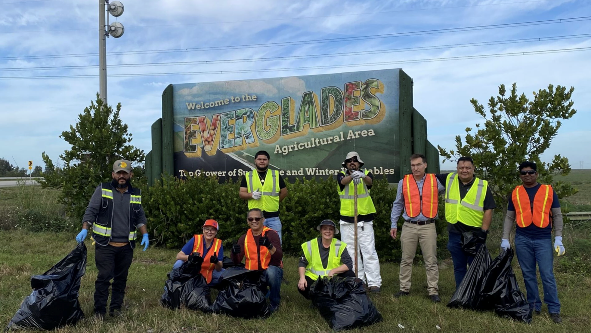 Employee Volunteers Beautify the Entrance to our EAA Farming Community